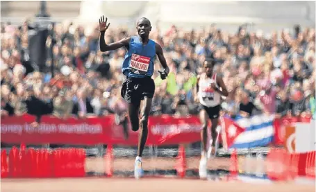  ?? Pictures: PA. ?? Daniel Wanjiru on his way to winning the Men’s Virgin Money London Marathon.