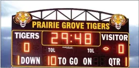  ?? MARK HUMPHREY ENTERPRISE-LEADER ?? The scoreboard at Prairie Grove’s Tiger Den Stadium will light up Friday when the Tigers host a second-round playoff game. Kickoff is at 7 p.m.