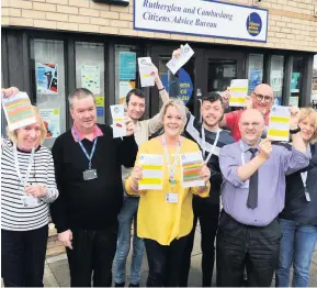  ??  ?? Top team Volunteers at Rutherglen and Cambuslang bureau celebrate