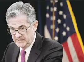  ?? Alex Wong Getty Images ?? JEROME H. POWELL heads the Federal Reserve, which bought trillions of dollars of Treasury bonds and mortgage-backed securities to boost the economy.