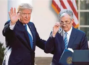  ?? REUTERS PIC ?? United States President Donald Trump (left) with Jerome Powell, his nominee to become the next chairman of the Federal Reserve, at the White House yesterday.