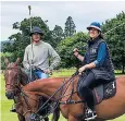  ??  ?? Nick Roldan on Krissy and Charlotte Lytton on Red at the Cowdray Park estate