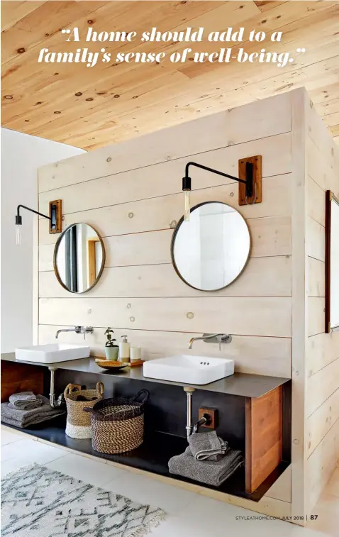  ??  ?? RIGHT An open shelf holding woven baskets and folded towels sets the tone for a laid-back bathroom. Towels tuck neatly into baskets, and the kilim rug underfoot feels “faraway casual,” says Jennifer. Brass fixtures add warmth and style, while swiveling...