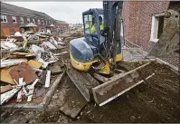  ?? File photo ?? Tear-down work continues at Washington Village in Norwalk in 2018.