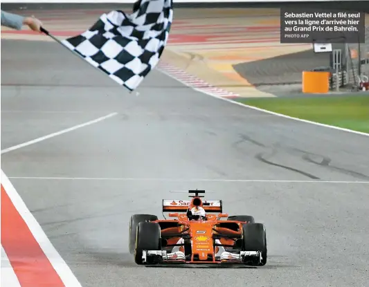  ??  ?? Sebastien Vettel a filé seul vers la ligne d’arrivée hier au Grand Prix de Bahreïn.