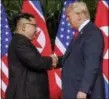  ?? EVAN VUCCI — THE ASSOCIATED PRESS ?? U.S. President Donald Trump shakes hands with North Korea leader Kim Jong Un at the Capella resort on Sentosa Island Tuesday in Singapore.