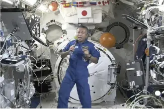  ?? The Yomiuri Shimbun ?? Astronaut Koichi Wakata answers questions during an online press conference from the Internatio­nal Space Station in October.