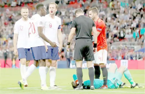  ?? Reuters photo ?? England’s Harry Kane appeals to referee Danny Makkelie after Danny Welbeck had a goal disallowed following a challenge on Spain’s David De Gea. —