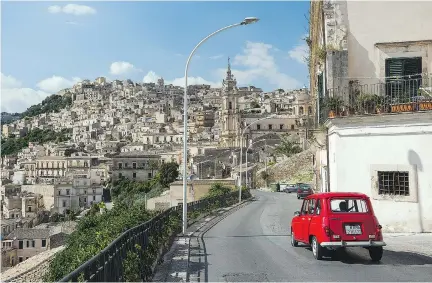  ?? DOMINIC ARIZONA BONUCCELLI ?? Brace yourself for driving in Italian cities such as Modica in Sicily: Drivers may be more aggressive than you’re used to.