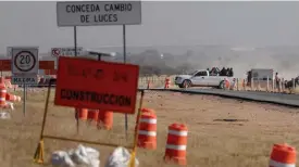  ??  ?? Workers leave the Ford constructi­on site after they were sent home early the day after the U.S. auto company cancelled plans to build its plant in Villa de Reyes, outside San Luis Potosi, Mexico, Wednesday, Jan. 4, 2017. An average worker in Mexico...