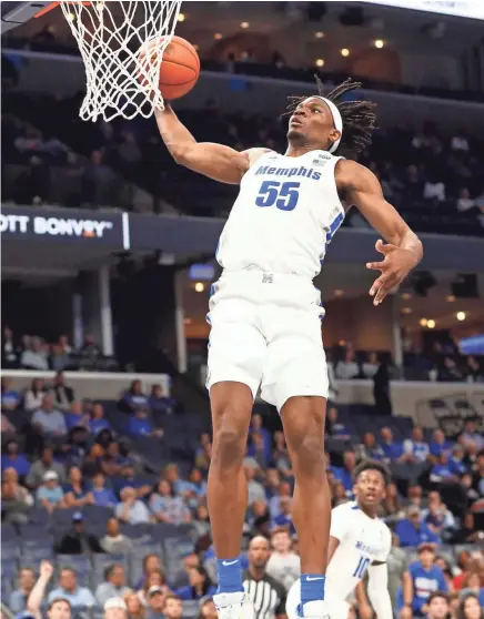  ?? JOE RONDONE/THE COMMERCIAL APPEAL ?? Memphis Tigers forward Precious Achiuwa dunks on a fast break against the New Orleans Privateers on Dec. 28, 2019.