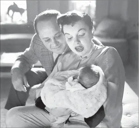  ?? Showtime ?? SID LUFT, Judy Garland and newborn Joey Luft in a photo from Showtime’s documentar­y about the performer’s life, “Sid & Judy.”