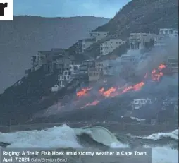  ?? Gallo/Brenton Geach ?? Raging: A fire in Fish Hoek amid stormy weather in Cape Town,
April 7 2024