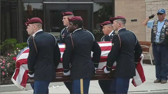  ?? Getty Images ?? The remains of United States Army SPC Michael Nance arrive at Trinity United Church of Christ for his visitation and funeral service on Tuesday in Chicago. Nance died July 29 of wounds sustained in a combat-related incident in Tarin Kowt, in southern Afghanista­n.