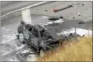  ?? PETE BANNAN ?? Firefighte­rs had to put out a car fire after four vehicles collided in the westbound lanes of the Pennsylvan­ia Turnpike.