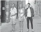  ?? SCOTT YAMANO/NETFLIX ?? Nick (Sandler) with Audrey (Aniston) in discount wedges and Luis Gerardo Mendez.