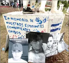  ??  ?? View of a memorial for dead protesters at Upoli University after being attacked during recent protests following an attempt by Ortega to reform the near-bankrupt social security system. — AFP photo