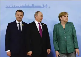  ?? Bild: TOBIAS SCHWARZ/TT/AP ?? TUNGA NAMN. Frankrikes president Emmanuel Macron, Rysslands president Vladimir Putin och Tysklands förbundska­nsler Angela Merkel ska mötas och diskutera situatione­n i Syrien.