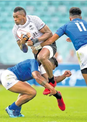  ?? Photo: Kitione Rokomanu/ZoomFiji ?? Fiji Airways Fijian 7s player Sevuloni Mocenacagi on the attack against Samoa during Pool play of the Sydney 7s at the Allianz Stadium on January 26, 2018.