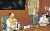  ?? PTI ?? Amit Shah at a meeting with CM Kejriwal and other officials. n