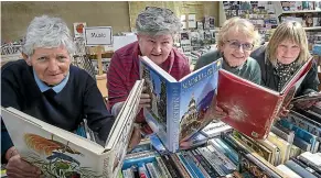  ?? JOHN BISSET/STUFF ?? Preparing for this weekend’s Waimate Bookarama are, from left, Lyn Chave, Karen Lewis, Raewyn Francis and Adrianne Jury.