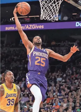  ?? AP ?? Suns forward Mikal Bridges goes to the basket against the Lakers on April 5 in Phoenix. The Suns won 121-110.