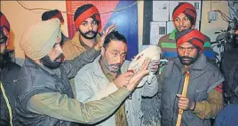  ??  ?? A cop who was injured after protesters pelted the Gate Hakima police station in Amritsar with stones on Sunday. HT PHOTO