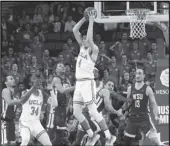  ?? KEVIN REECE Special to the Valley Press ?? BOARD UCLA’s Jaime Jaquez Jr. pulls down a rebound during a Pac-12 game against Washington State on Thursday at UCLA.