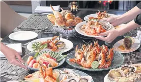  ??  ?? Friday and Saturday seafood buffet at Up &amp; Above restaurant, Okura Prestige Bangkok.