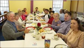  ??  ?? The crowd was so big for the American Tea Party that some of the tables had to be placed in the church.