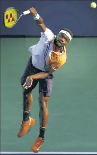  ?? Getty Images ?? ACE IN THE HOLE: Frances Tiafoe serves in his 6-1, 6-1, 4-6, 6-4 victory over No. 29 Adrian Mannarino at the U.S. Open on Tuesday.