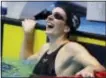  ?? MICHAEL CONROY — THE ASSOCIATED PRESS ?? Hannah Stevens smiles as she sees her time after winning the women’s 50-meter backstroke in Indianapol­is on Thursday.