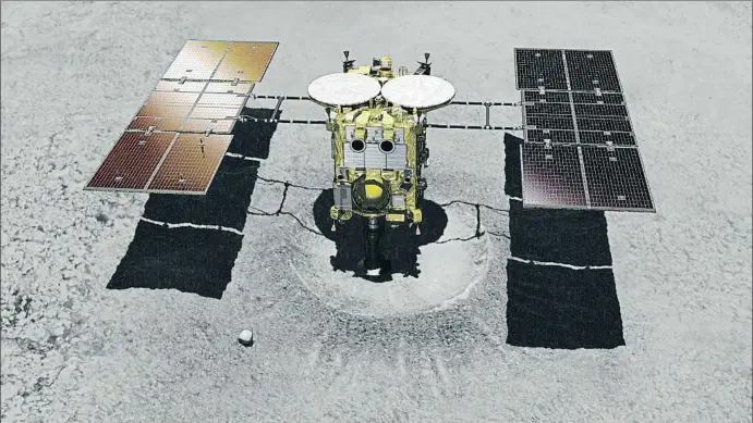 ?? AP ?? Imagen virtual del explorador espacial japonés Hayabusa2 , que llegó ayer al asteroide Ryugu y se posará hasta tres veces en su superficie para recoger muestras