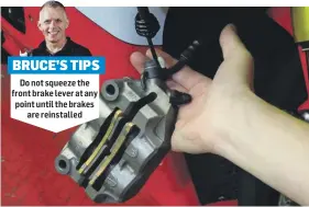  ??  ?? BRUCE’S TIPS
Do not squeeze the front brake lever at any point until the brakes are reinstalle­d