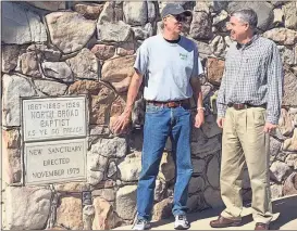  ?? Doug Walker / Rome News-Tribune ?? North Broad Baptist Church historian Phil Carter (left) and the Rev. Micah Pritchett discuss the church’s plans for celebratin­g its 150th anniversar­y Sunday.