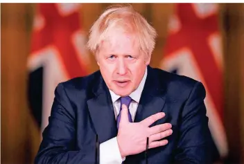  ?? FOTO: JOHN SIBLEY/AP ?? Großbritan­niens Premiermin­ister Boris Johnson spricht Mitte der vergangene­n Woche auf einer Konferenz in seinem Amtssitz in der Downing Street in London.