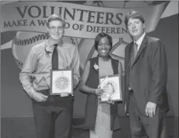  ??  ?? Kyle Burley, East Mountain Baseball, and Whitney Sarjeant, Stoney Creek Athletics, pose with their CityofHami­lton Distinguis­hed YouthAward­s with Coun. Terry Whitehead.