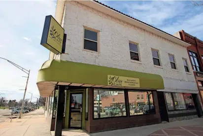  ?? KEISHERA LATELY/THE CAPITAL-JOURNAL ?? Olive Cafe, 935 S. Kansas Ave., will soon close its doors for business while owner Tony Mashaal preps a new location to house the popular Mediterran­ean restaurant.