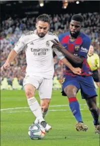  ??  ?? Carvajal y Umtiti, en el Clásico del 1 de marzo.