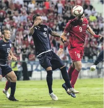  ?? Antonie Robertson / The National ?? Syria striker and captain Omar Al Somah was relentless as he scored a hat-trick against Guam at Al Maktoum Stadium in Dubai where Syria were the home team