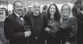  ??  ?? From left: orthopedic surgeon Jim Ferrari, with Gary Steuer, president/ceo of the Bonfils-stanton Foundation; Gina Ferrari, the foundation’s director of grants; and Deborah Jordy, executive director of the Scientific and Cultural Facilities District.