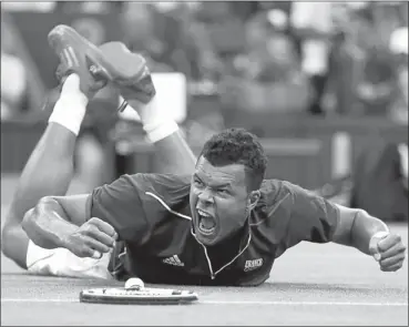  ?? Picture: REUTERS ?? REJOICING: France’s Jo-Wilfried Tsonga celebrates after winning his men’s singles tennis match against Brazil's Thomaz Bellucci at the All England Lawn Tennis Club during the London Olympics Games.