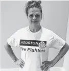  ??  ?? Jillian Ostrewich, who is married to a Houston firefighte­r, was told by election officials that she couldn’t wear this shirt to a Harris County polling place last year.