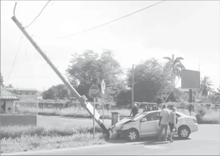  ??  ?? A series of mishaps:
This motor car crashed into a utility post a few feet away from the junction of Hadfield Street and Vlissengen Road on Saturday. Stabroek News was told that the car grazed a bus and drove away but moments later crashed into a new...
