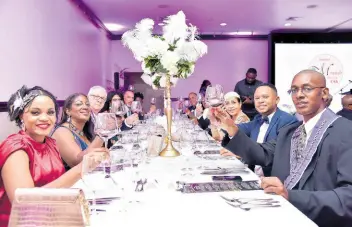  ?? PHOTOS BY ANTOINE LODGE/PHOTOGRAPH­ER ?? Chaîne des Rôtisseurs members and their guests enjoying great food and ambiance during dinner at The Jamaica Pegasus hotel in Kingston.