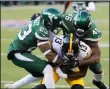  ?? SETH WENIG - THE ASSOCIATED PRESS ?? FILE - In this Sunday, Dec. 22, 2019file photo, Pittsburgh Steelers wide receiver James Washington (13) runs with the ball as New York Jets cornerback Arthur Maulet (23) and New York Jets linebacker Neville Hewitt (46) try to stop him in the second half of an NFL football game in East Rutherford, N.J.