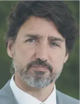  ?? - La Presse canadienne: Adrian Wyld ?? Le premier ministre Justin Trudeau