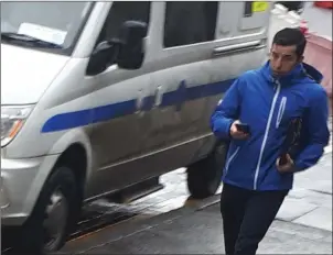  ??  ?? Sergeant John Walsh arriving at Sligo Courthouse. Mark Harte is pistured (right).