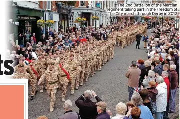  ?? ?? The 2nd Battalion of the Mercian regiment taking part in the Freedom of The City march through Derby in 2012