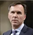  ?? ADRIAN WYLD, THE CANADIAN PRESS ?? Bill Morneau faces allegation­s of conflict of interest.